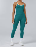 Teal green seamless camisole tank with removable chest pads and white trim detail, stylish athletic wear for fitness training