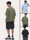 Male model wearing oversized cool-touch tee in multiple colorways, front and back views