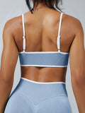 Baby blue seamless sports bra back view with adjustable straps
